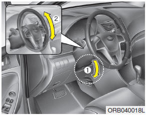 To change the steering wheel angle, pull down the lock release lever (1), adjust