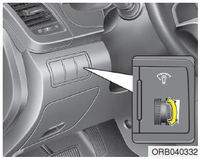 When the vehicle’s parking lights or headlights are on, press the upper or lower