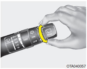 The rear window wiper and washer switch is located at the end of the wiper and