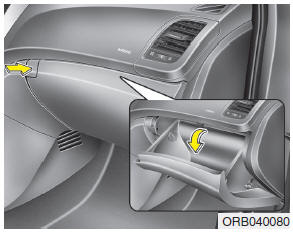 To open the glove box, push the button and the glove box will automatically open.